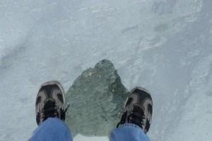 cloudy sky reflected in glass floor